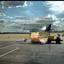 A small airplane sitting on the tarmac at an airport..jpg